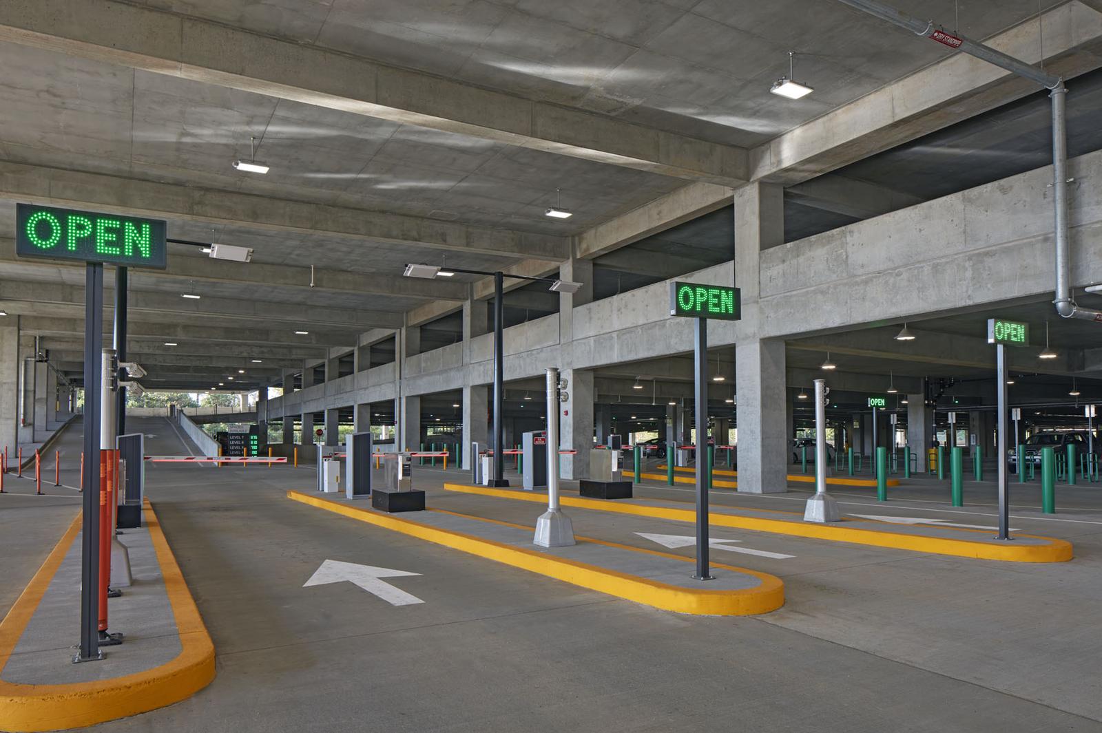 Entry lanes at ATL West Deck with dynamic "OPEN" signs