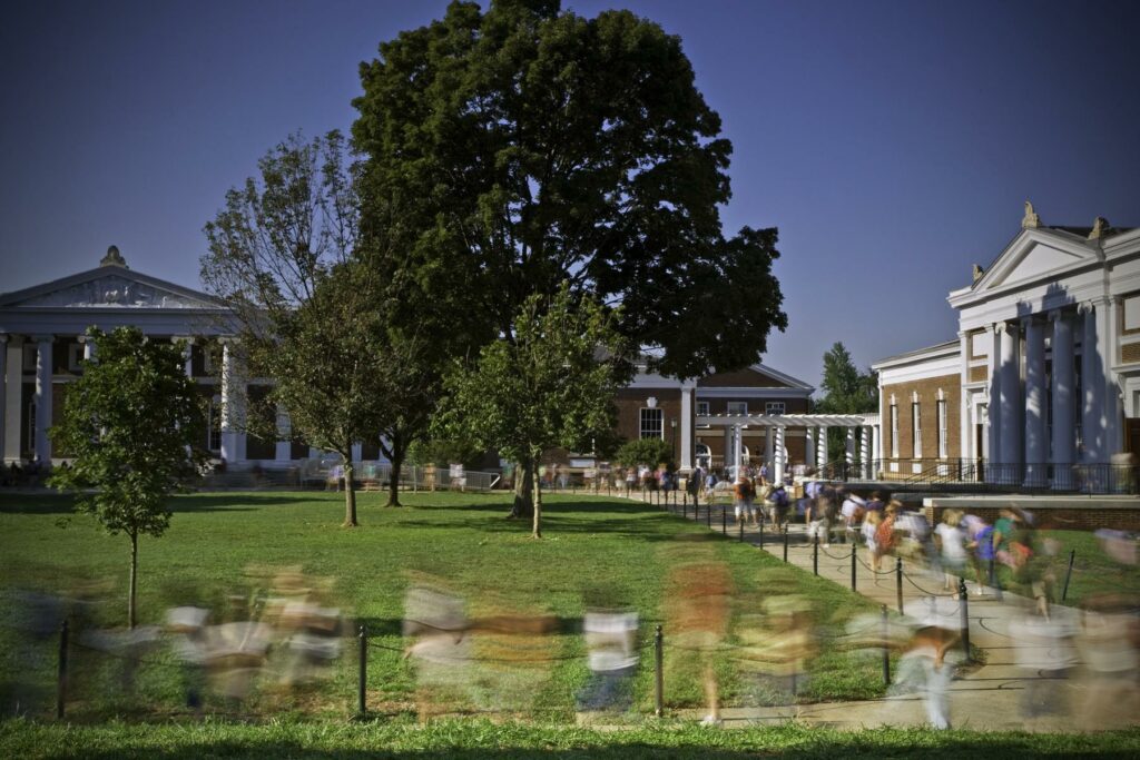 A university campus with sidewalks full of people