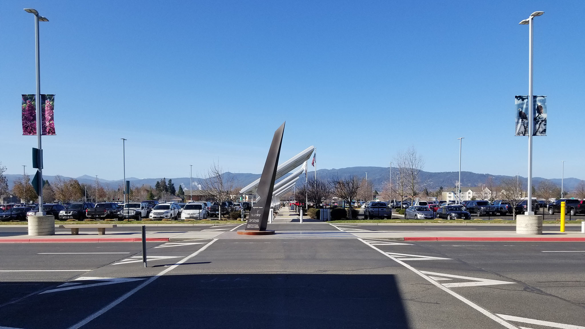 Parking at Medford airport with mountains in the distance