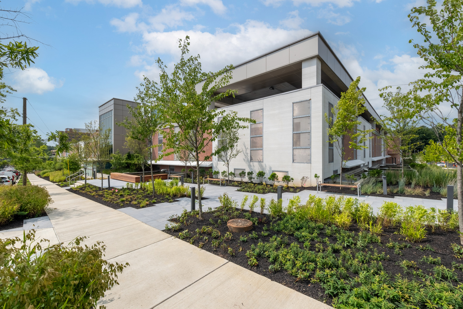 Exterior of the VHC garage showing extensive landscaping and rainwater retention ponds